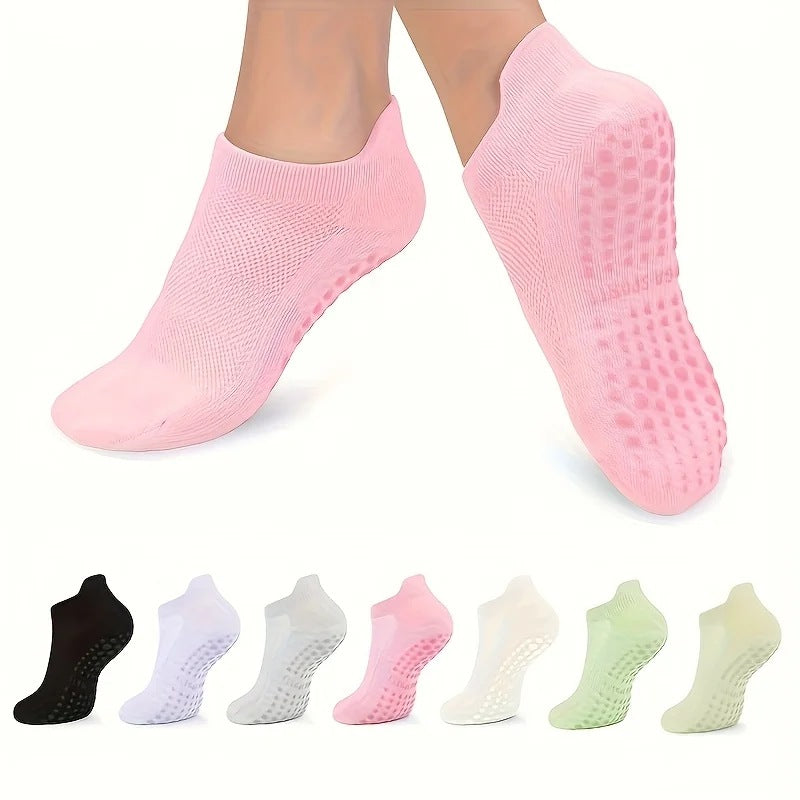 Pastel low ankle grip socks in pink on the foot, with colour swatches