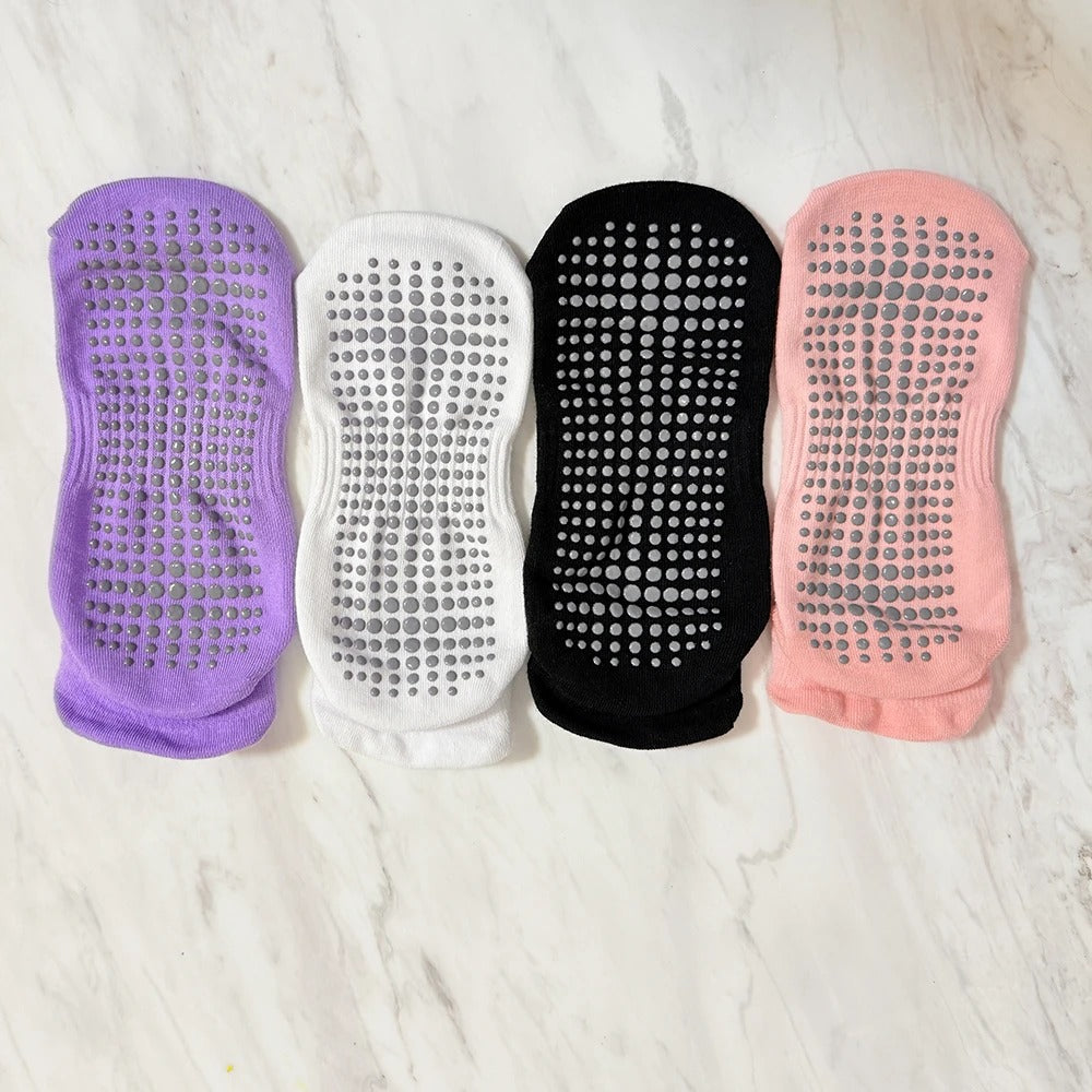 Pastel grip socks gift set laid flat showing the silicone dot soles